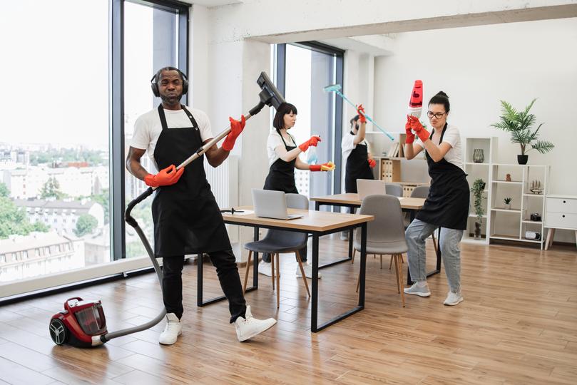 Commercial cleaners cleaning an office space