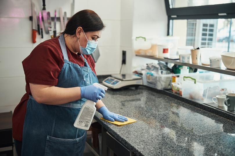 Commercial cleaners cleaning an office space