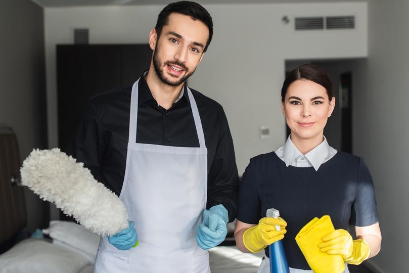 Cleaning professional cleaning a house